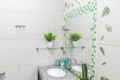 Uma casa de banho em Apartamento BEIRA MAR