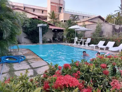 A piscina em ou perto de Cumbuco - Casa de praia com piscina e deck
