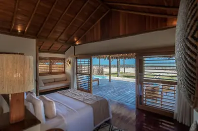 Uma cama ou camas num quarto em Jaguaríndia Village