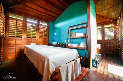 Uma cama ou camas num quarto em Vila Vagalume