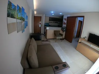 Uma televisão e/ou sistema de entretenimento em [Kariri 215] 46m², pé na areia, varanda vista mar!
