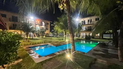 A piscina em ou perto de Lindo Flat Na Paradisíaca Praia da Taíba
