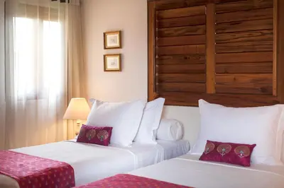 Uma cama ou camas num quarto em Zorah Beach Hotel
