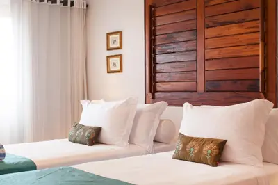 Uma cama ou camas num quarto em Zorah Beach Hotel