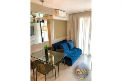Uma área de estar em Landscape Flat Charmoso Condomínio na Beira Mar