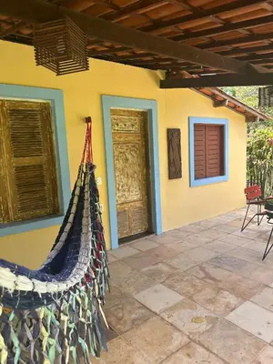 Um pátio ou outra área exterior em Chalé Aroeira Taiba