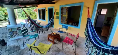 Uma varanda ou terraço em Chalé Aroeira Taiba