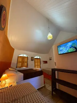 Uma cama ou camas num quarto em Pousada JeriMagia