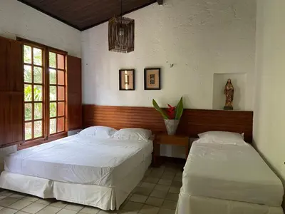 Uma cama ou camas num quarto em Casa Amarela