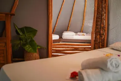 Uma cama ou camas num quarto em Treehouse Kitecamp Jericoacoara