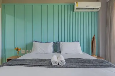 Uma cama ou camas num quarto em Wai Wai Resort #307 - Apê luxuoso por Carpediem