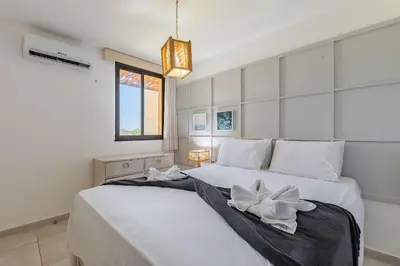 Uma cama ou camas num quarto em Wai Wai Resort #307 - Apê luxuoso por Carpediem