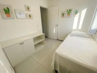Uma cama ou camas num quarto em Beach Townhouses I por Be My Guest