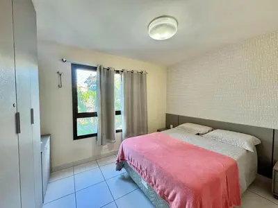 Uma cama ou camas num quarto em VG SUN CUMBUCO 2 quartos - B2, apto 205