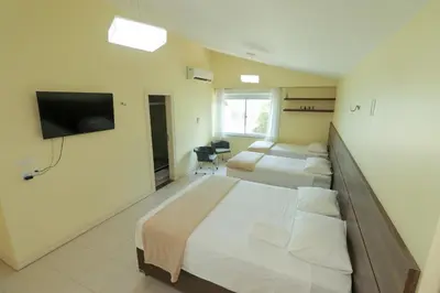 Uma cama ou camas num quarto em ALIZE CUMBUCO