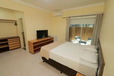 Uma cama ou camas num quarto em ALIZE CUMBUCO