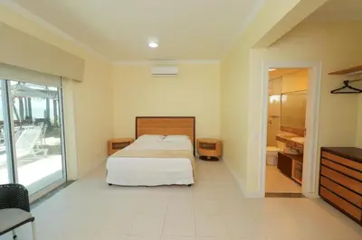 Uma cama ou camas num quarto em ALIZE CUMBUCO