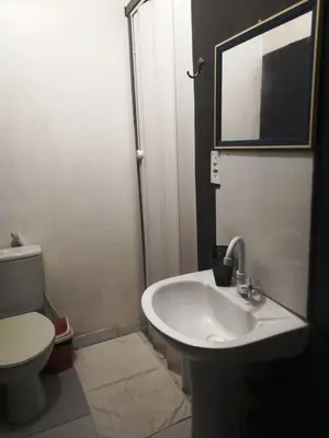 Uma casa de banho em Benu Suítes