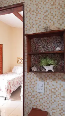 Uma cama ou camas num quarto em Vila Vintém Chalés