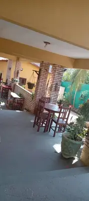 Um restaurante ou outro lugar para comer em Village Lagoinha Ceará