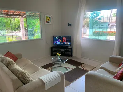 Uma televisão e/ou sistema de entretenimento em CASA LAGOA DO BANANA/CUMBUCO
