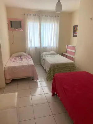 Uma cama ou camas num quarto em CASA LAGOA DO BANANA/CUMBUCO