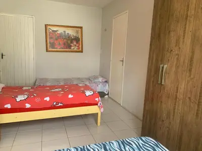 Uma cama ou camas num quarto em CASA LAGOA DO BANANA/CUMBUCO