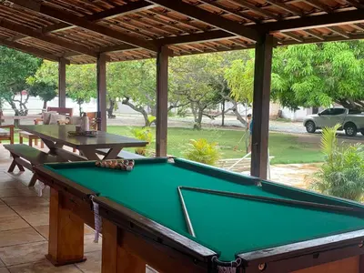 Uma mesa de bilhar em CASA LAGOA DO BANANA/CUMBUCO