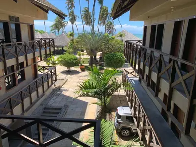 Uma varanda ou terraço em Condomínio com vista para o Mar e Piscina no CUMBUCO- AP 106