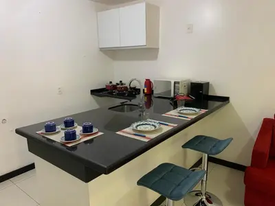 A cozinha ou kitchenette de Condomínio com vista para o Mar e Piscina no CUMBUCO- AP 106
