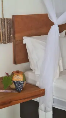 Uma cama ou camas num quarto em Villa Água de Côco Preá