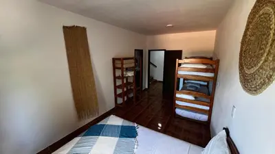 Uma cama ou camas num quarto em Casa Movimento