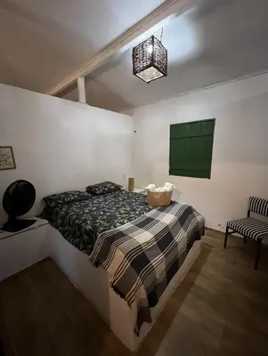 Uma cama ou camas num quarto em Pousada Vila Matury