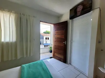 Uma cama ou camas num quarto em Teto Hospedagens Va