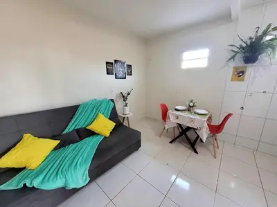 Uma área de estar em Teto Hospedagens Va