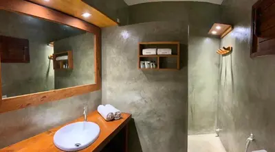 Uma casa de banho em Pousada Borboleta