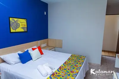Uma cama ou camas num quarto em Kalamari Beach Hotel
