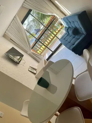 Uma área de estar em VG SUN Cumbuco 1 Quarto