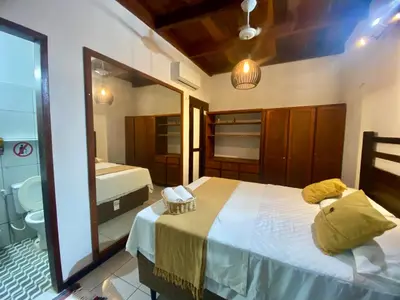 Uma cama ou camas num quarto em Casa Amiga Jeri