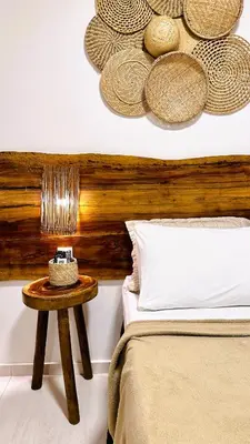 Uma cama ou camas num quarto em Suítes Jardins de Flecheiras