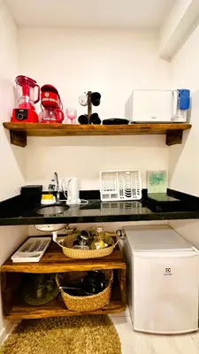 A cozinha ou kitchenette de Suítes Jardins de Flecheiras