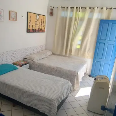 Uma cama ou camas num quarto em Porto Canoa Apartamento com vista para o Mar - Rhodes 203, Aracati, CE