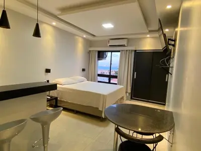 Uma cama ou camas num quarto em 402 Lindo Flat mobiliado Praia de Iracema