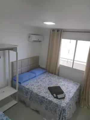 Uma cama ou camas num quarto em Apto Privado no Edifício Helbor My Way Abolição