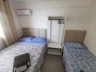 Uma cama ou camas num quarto em Apto Privado no Edifício Helbor My Way Abolição