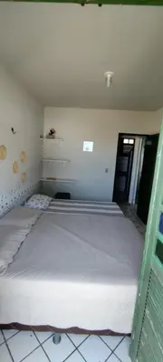 Uma cama ou camas num quarto em Porto Canoa, Chios Ap 102 , Aracati, CE