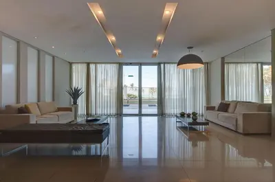 Uma área de estar em Beach Village #403 - Praia do Futuro por Carpediem