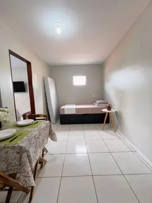 Uma cama ou camas num quarto em Teto Hospedagens