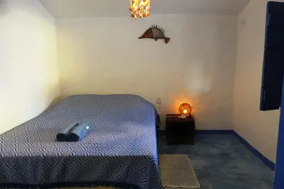 Uma cama ou camas num quarto em Casinha da Curva