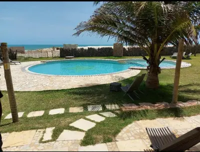 A piscina em ou perto de VILAS NA PRAIA RESIDENCE O PARAÍSO É AQUI